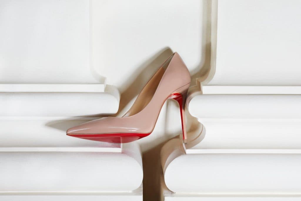 Mame Fashion Dictionary: Christian Louboutin. Iconic Red Sole Stiletto.