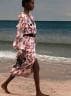 Mame Moda Chanel SS19 sfila in riva al mare. Abito stampa ombrelloni