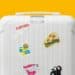 Mame Moda Rimowa personalizza le valigie per il natale. valigia con stickers